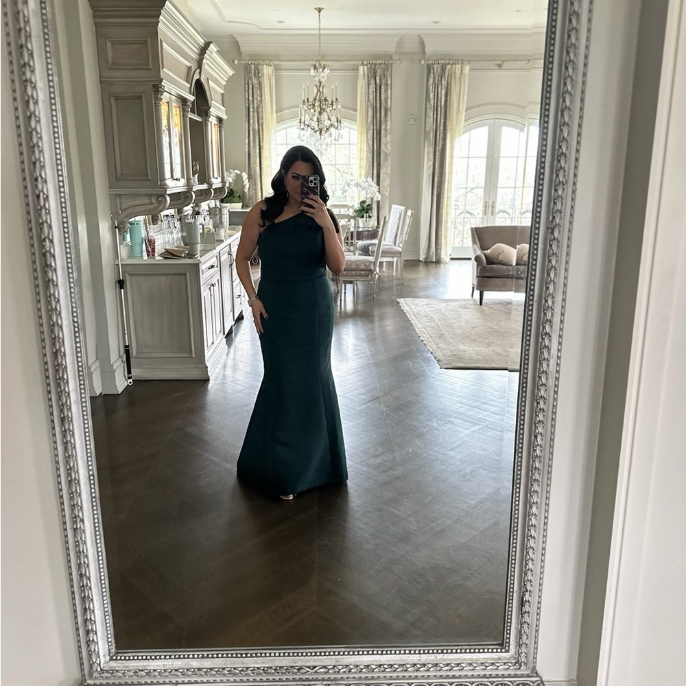 Dark green one shoulder bow fit/flare gown.